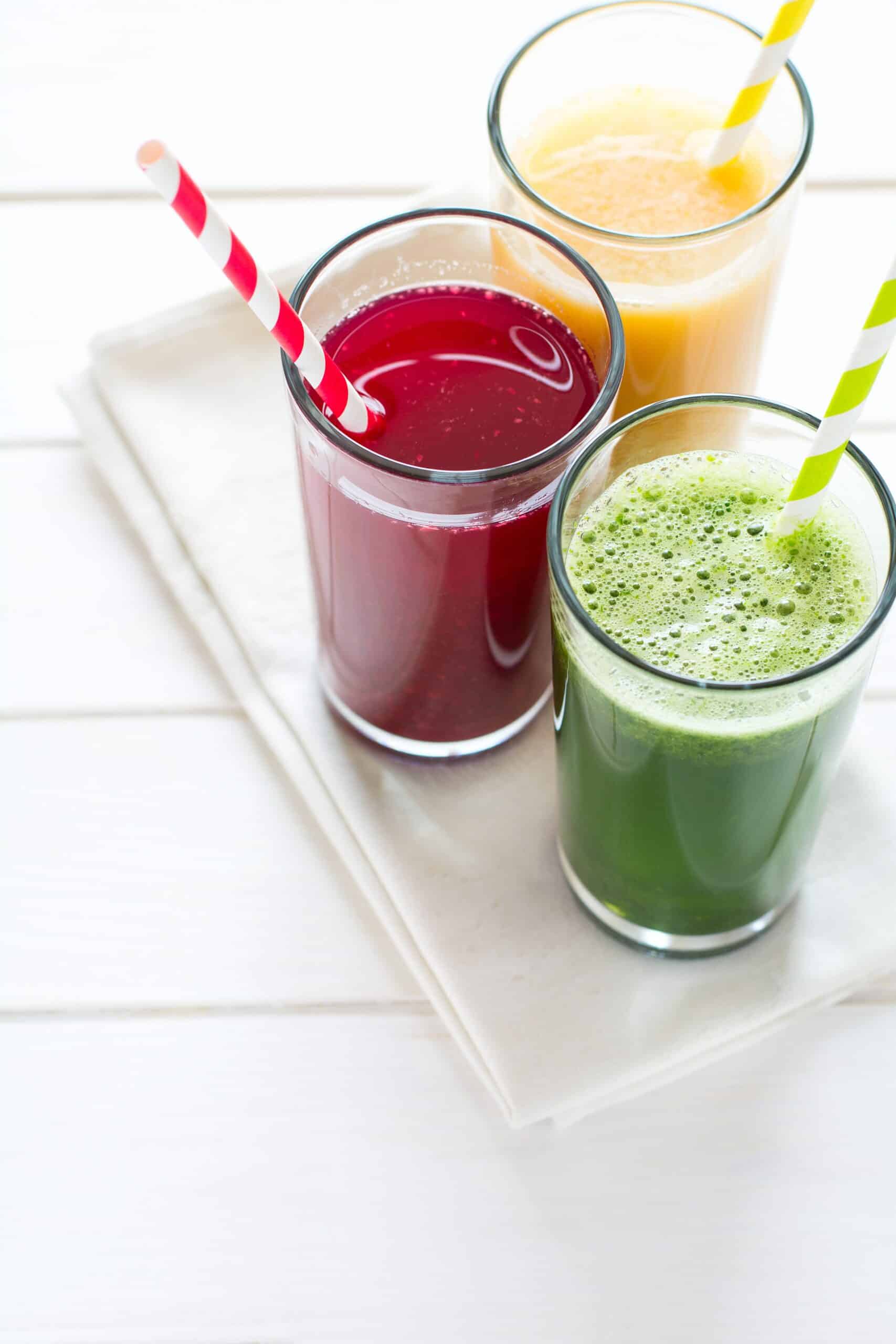 Detox drinks in glass: fresh smoothies from vegetables: beet, pu
